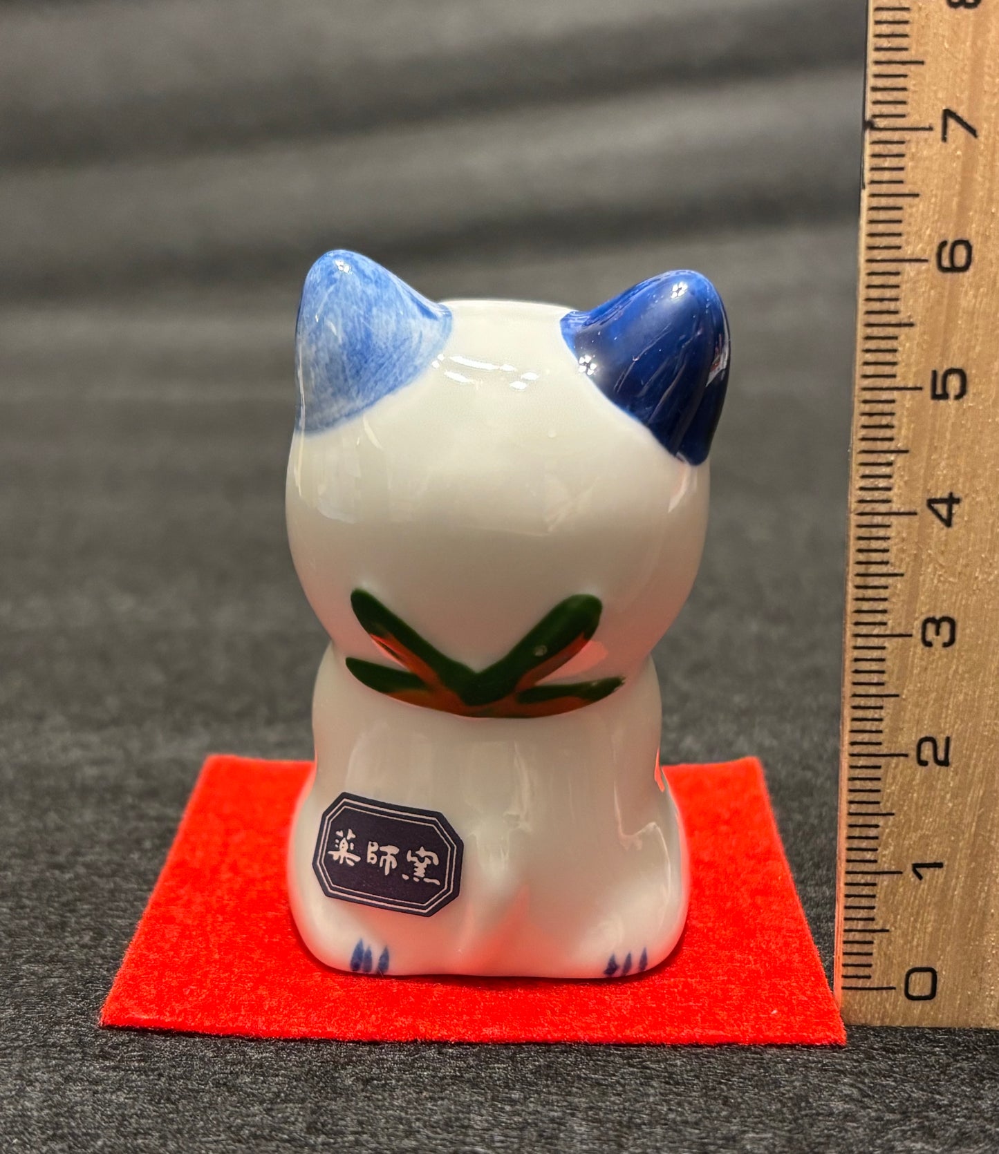 Blue and white ceramic Manekineko