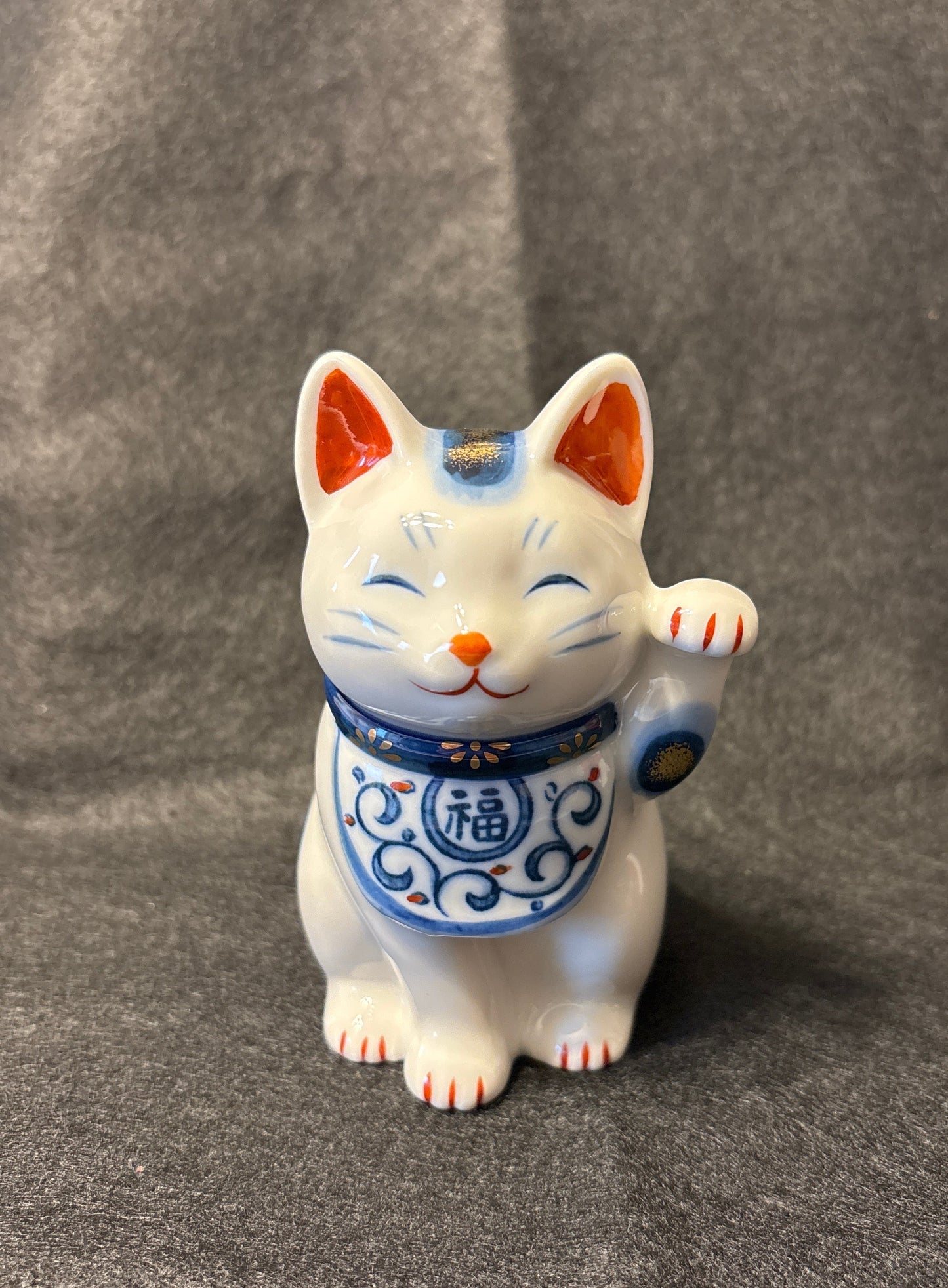 Maneki-neko – Porte-bonheur japonais traditionnel