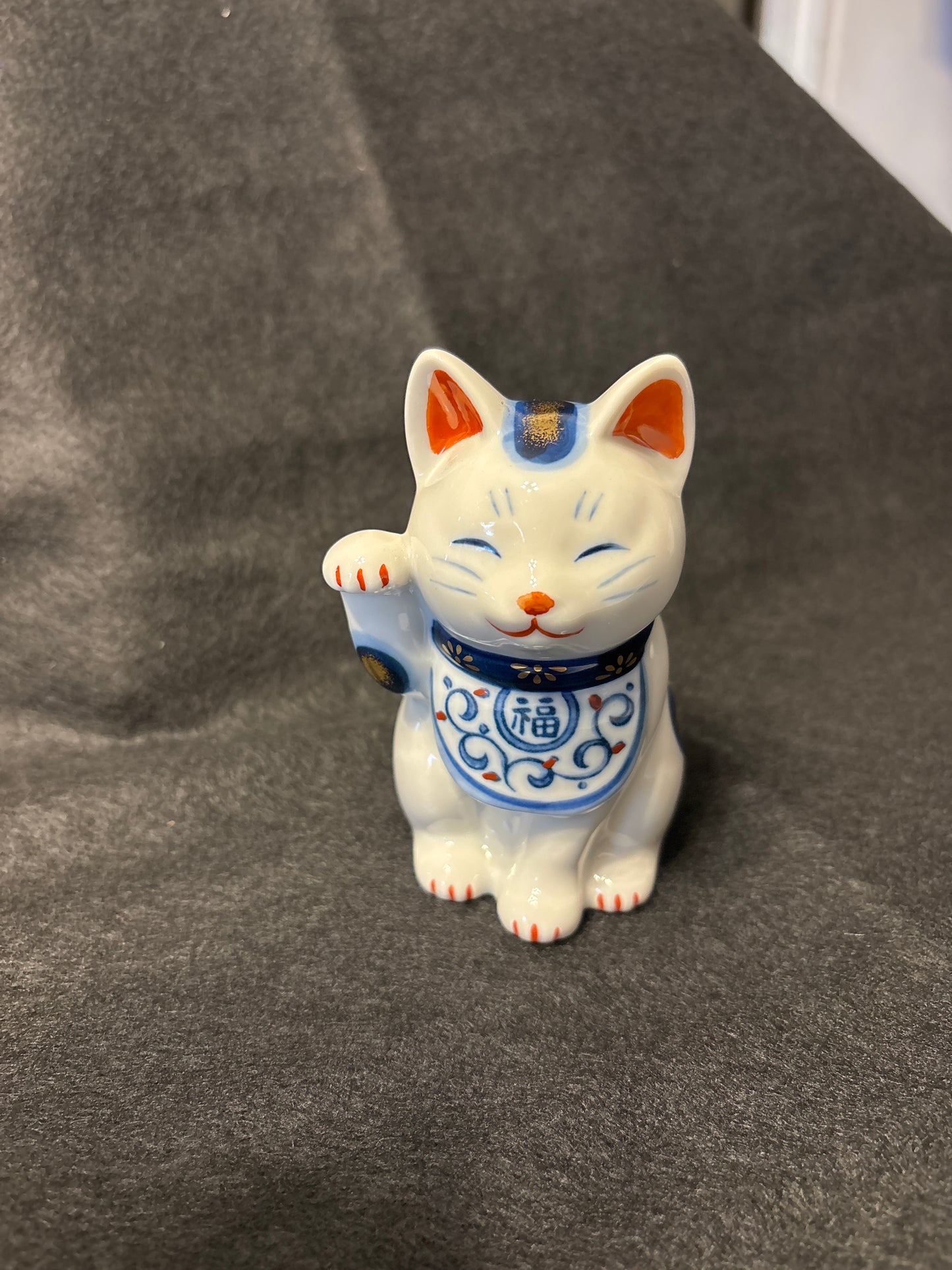 Maneki-neko – Porte-bonheur japonais traditionnel